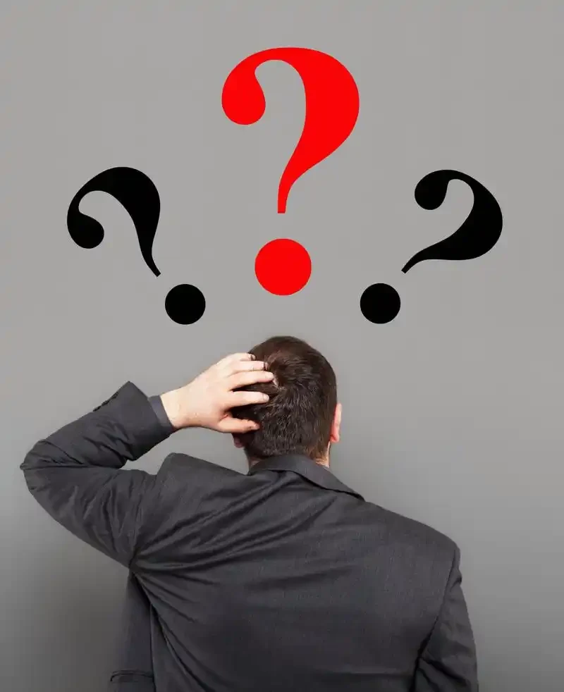 Buyer facing question marks, representing uncertainty about an unverified supplier